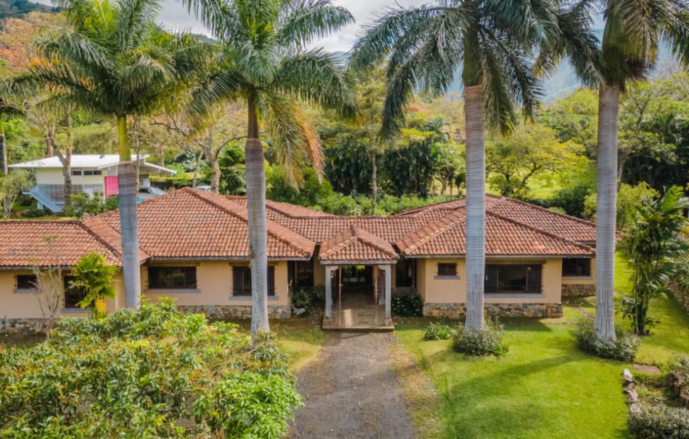 Casa Colonial — Santa Ana luxury estate with royal palms